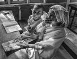 Paul Ravenscroft_Burmese-Monks-sharing-a-Western-Magazine